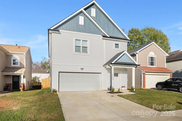 view of front of home featuring a front lawn and a garage