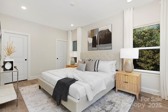 bedroom featuring hardwood / wood-style floors