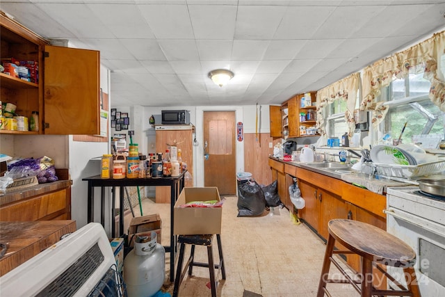 kitchen with sink and white stove