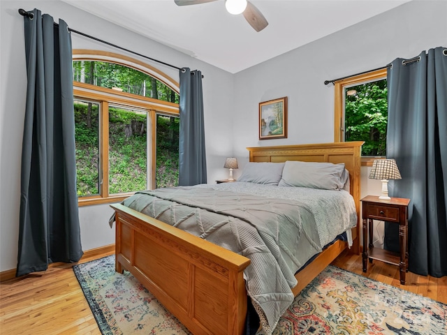 bedroom featuring ceiling fan and light hardwood / wood-style floors