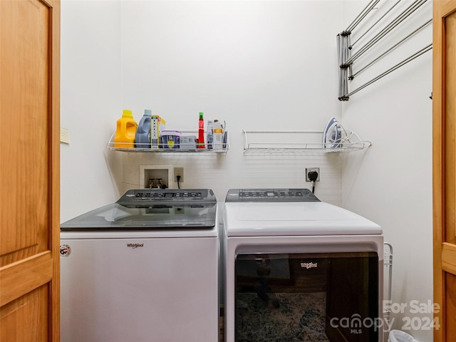 laundry area featuring independent washer and dryer