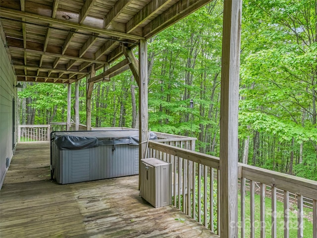 deck featuring a hot tub