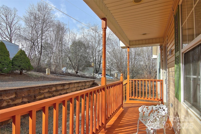 wooden terrace with covered porch