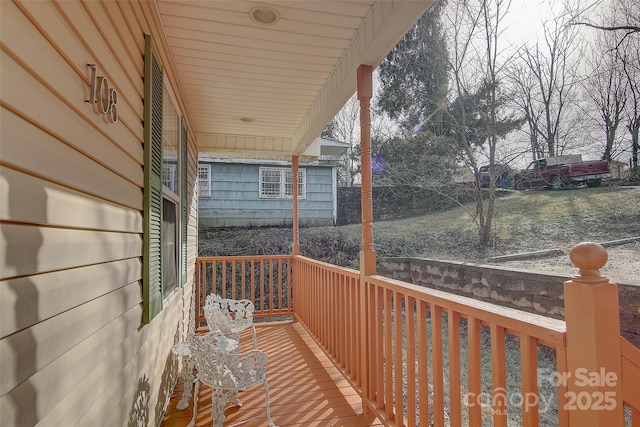 deck featuring covered porch