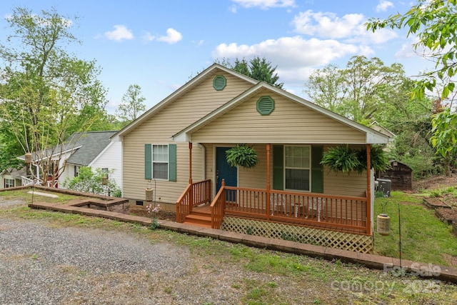 bungalow with a porch and crawl space