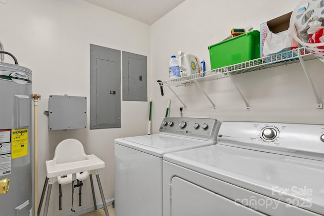 laundry room with separate washer and dryer, electric panel, water heater, and laundry area