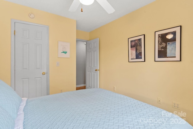 bedroom featuring ceiling fan
