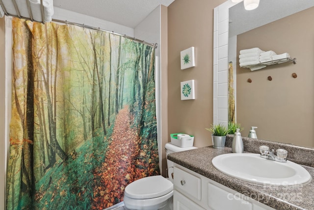 full bath with a shower with curtain, toilet, a textured ceiling, and vanity