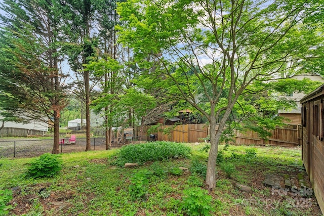 view of yard featuring fence