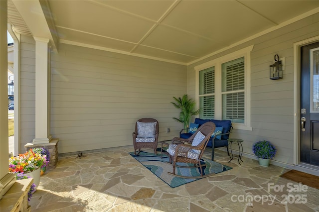 view of patio featuring covered porch