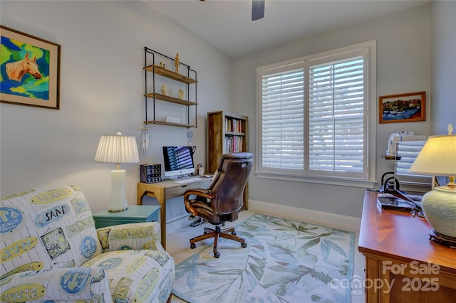 office space with ceiling fan