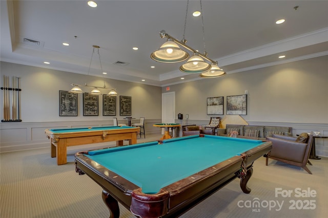 rec room with light carpet, crown molding, a raised ceiling, and billiards