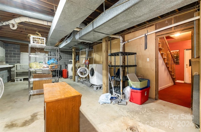 basement featuring washing machine and dryer