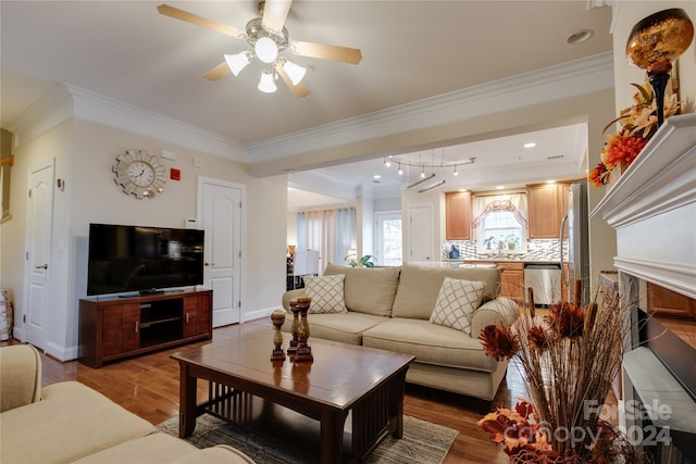 4335 Laurel Hill Ln, Charlotte, NC 28217 - living room with crown molding, light hardwood / wood-style flooring, ceiling fan, and sink