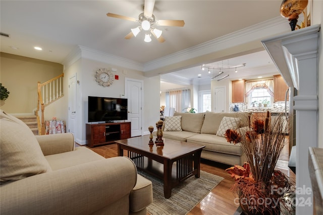 4335 Laurel Hill Ln, Charlotte, NC 28217 - living room with ceiling fan, light wood-type flooring, and ornamental molding