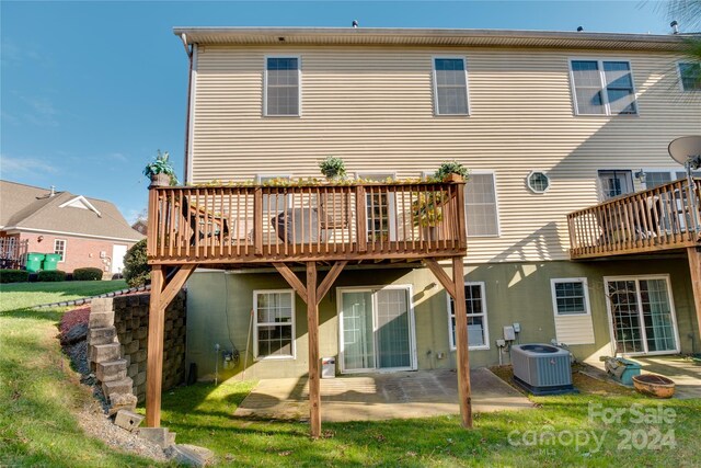 4335 Laurel Hill Ln, Charlotte, NC 28217 - back of house with a patio area, a wooden deck, and central AC unit