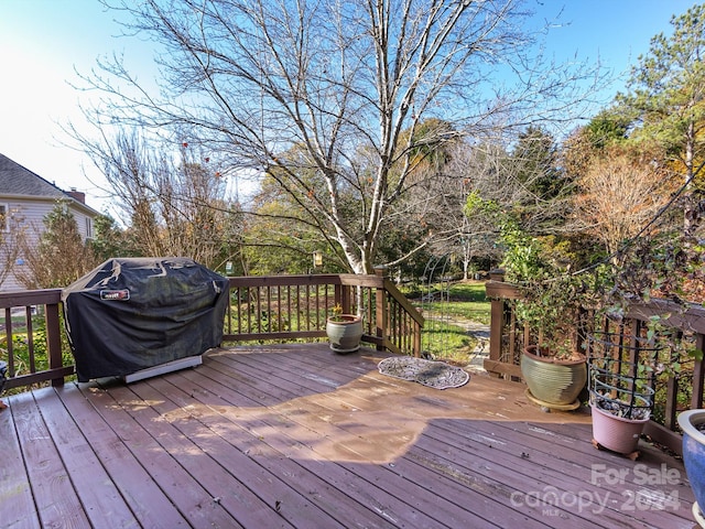 wooden terrace with grilling area