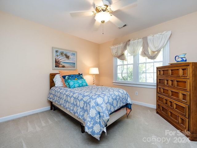 bedroom featuring carpet flooring and ceiling fan