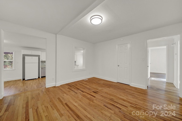 empty room featuring light hardwood / wood-style floors