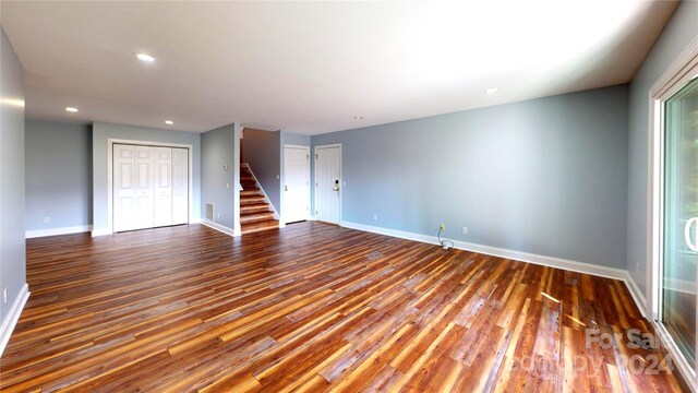 unfurnished room featuring hardwood / wood-style floors