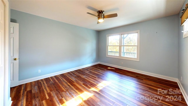 empty room featuring ceiling fan and wood-type flooring