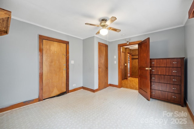 bedroom featuring ceiling fan, ornamental molding, and a closet