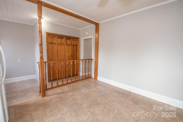 unfurnished room with ornamental molding