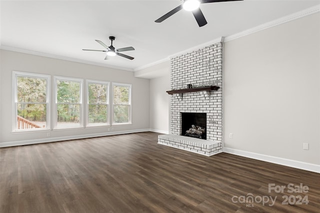 unfurnished living room featuring a fireplace, ceiling fan, dark hardwood / wood-style flooring, and ornamental molding