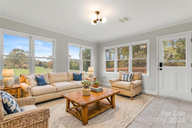 sunroom with a notable chandelier