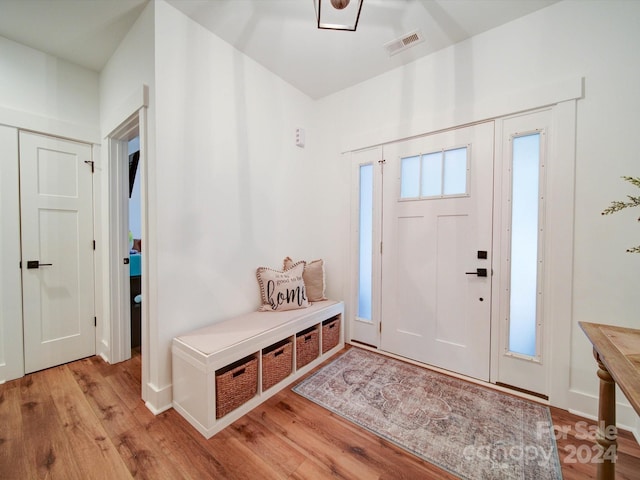 entryway with light hardwood / wood-style flooring