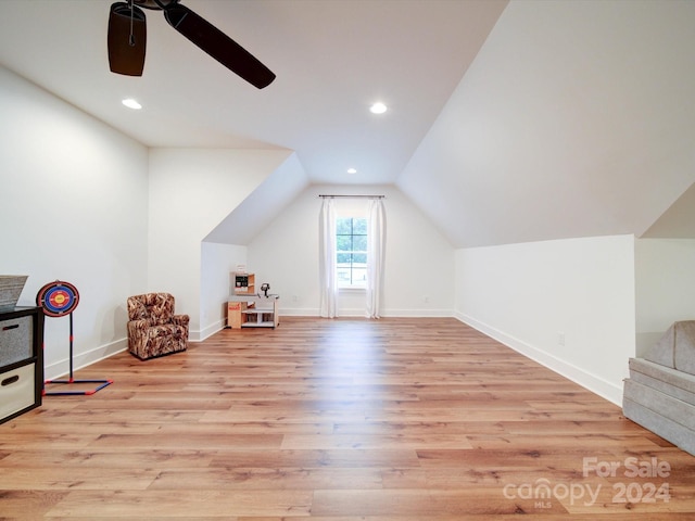 additional living space featuring ceiling fan, light hardwood / wood-style floors, and lofted ceiling