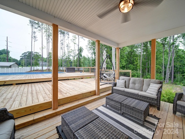 wooden deck featuring an outdoor hangout area