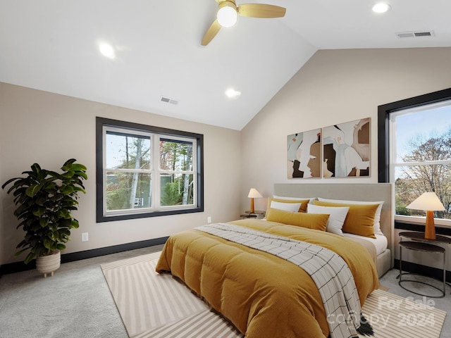 bedroom featuring light carpet, ceiling fan, and lofted ceiling