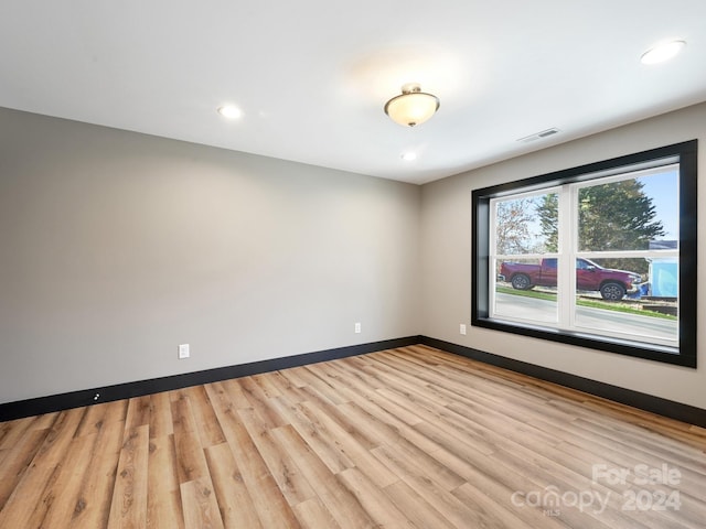 empty room featuring light hardwood / wood-style floors