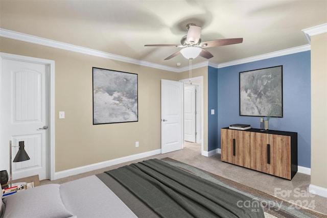 bedroom featuring light colored carpet, ceiling fan, and crown molding