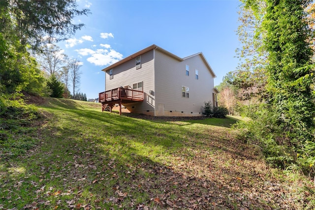 exterior space with a deck and a yard