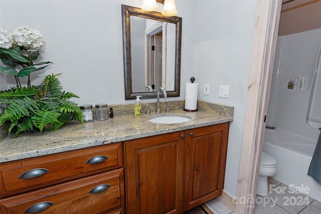 full bathroom featuring tile patterned floors, vanity, toilet, and shower / bathtub combination