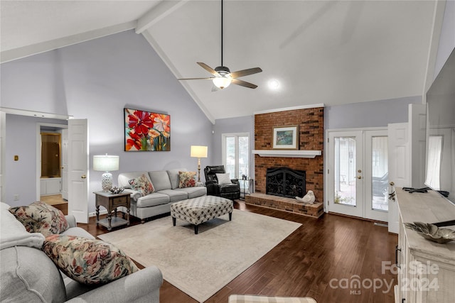 living room featuring ceiling fan, high vaulted ceiling, beamed ceiling, a fireplace, and dark hardwood / wood-style floors