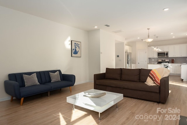 living room featuring light wood-type flooring