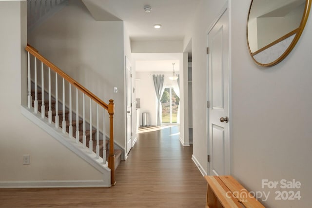 hall featuring hardwood / wood-style flooring