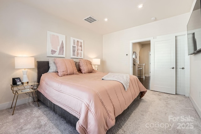 bedroom featuring light colored carpet