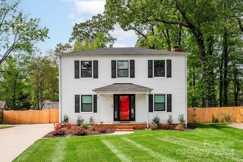 front of property with a front yard