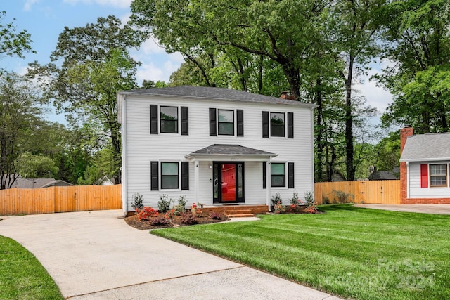 view of front of property with a front lawn