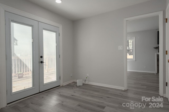 7704 Cedar Bluff Ln, Charlotte, NC 28227 - entryway with light hardwood / wood-style floors and french doors