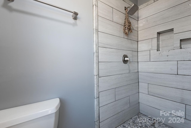 7704 Cedar Bluff Ln, Charlotte, NC 28227 - bathroom featuring toilet and a tile shower