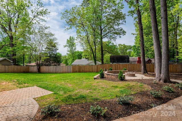 7704 Cedar Bluff Ln, Charlotte, NC 28227 - view of yard with a fire pit