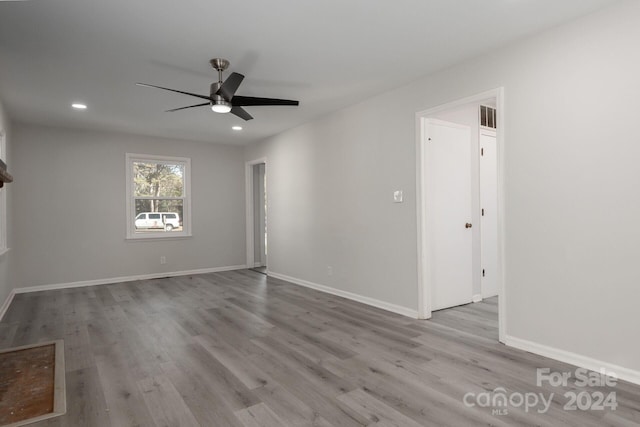 7704 Cedar Bluff Ln, Charlotte, NC 28227 - unfurnished room featuring light hardwood / wood-style flooring and ceiling fan
