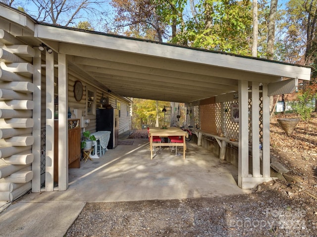 view of patio / terrace with a carport