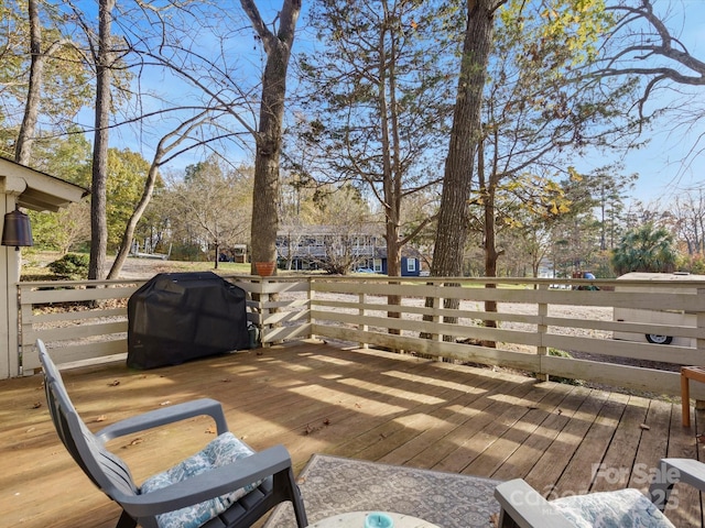 wooden terrace with grilling area