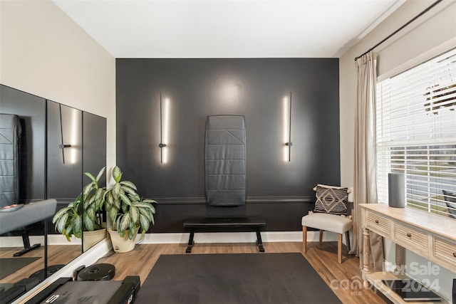 living area featuring hardwood / wood-style floors